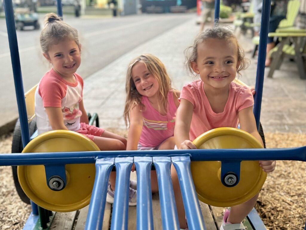 Three Cute Kids on Playground